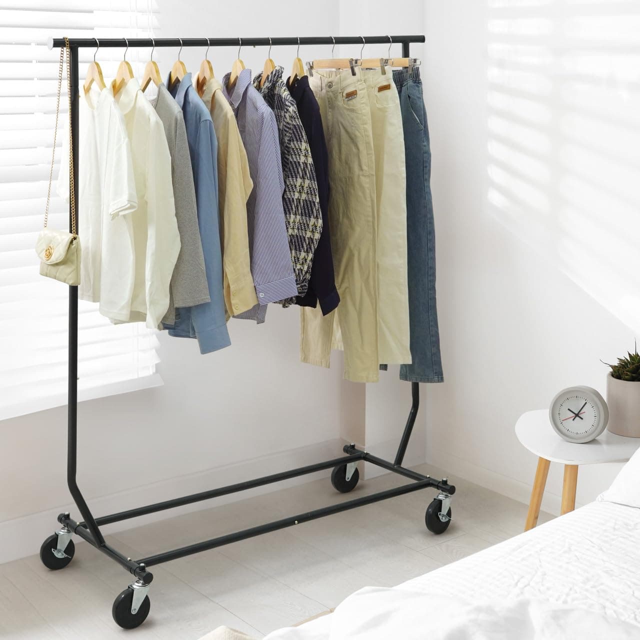 CAPHAUS Rolling 220LBS Capacity Clothing Rack, Adjustable & Extendable Black